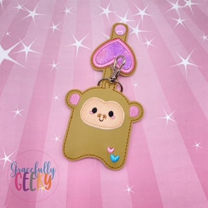 Monkey Sanitizer Holder 1oz ITH broderidesign 5x7 ring eller större
