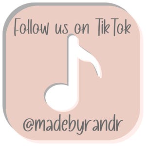 May include: A light pink square graphic with rounded corners. The text "Follow us on TikTok" is at the top in a handwritten font. A white musical note is in the centre. The text "@madebyrandr" is at the bottom.