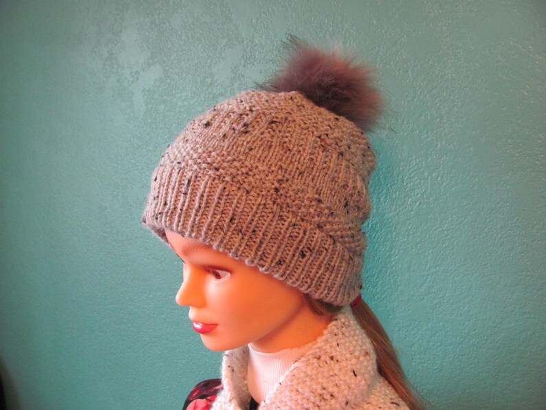 Knitted Beanie made with worsted weight gray colored yarn has Etsy