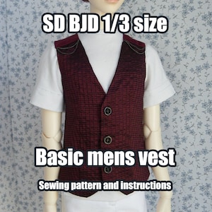 May include: A red vest with a white shirt underneath and gold chain accents. The vest has a button closure and is labeled "SD BJD 1/3 size Basic mens vest Sewing pattern and instructions".