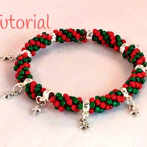 May include: Red and green beaded bracelet with silver charms in the shape of a star. The bracelet is made with small seed beads and has a spiral design. The word "Tutorial" is written in red letters at the top of the image.