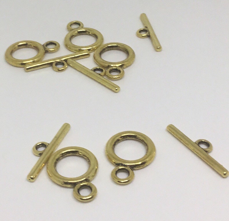 Toggle 5 Round gold finish circle wbar