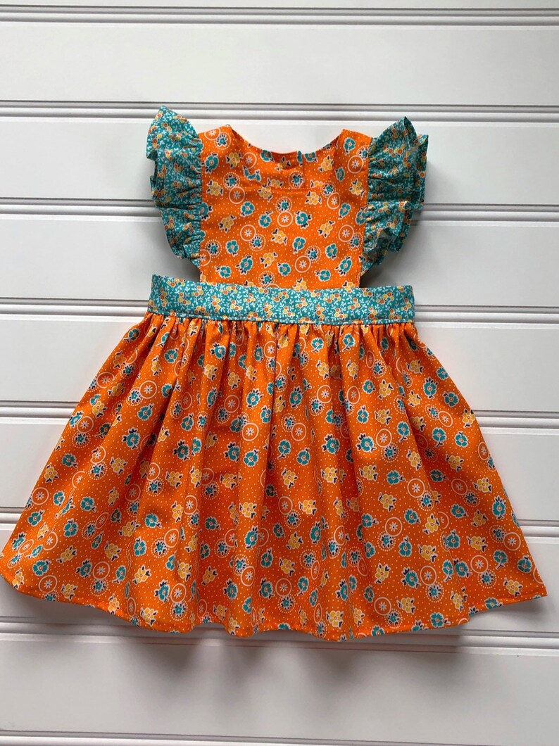 orange pinafore