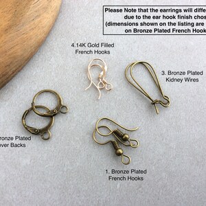 May include: An assortment of earring findings, including bronze-plated lever backs, French hooks, and kidney wires. The image also shows 4.14K gold-filled French hooks. Text on the image states that earring length will vary.