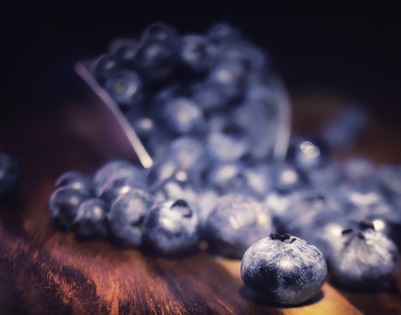 Blueberry Spill (Prints) Dark food photography of blueberries spilling on a wooden table