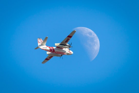 Tanker 82 enroute to the Moon (Metal Panel) CAL FIRE Tanker 82 flying in front of the Moon