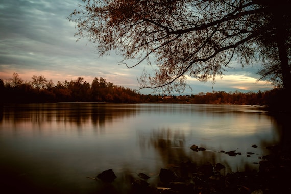 Subdued (Metal Panel) long exposure photograph of Sacramento River at Sunset reflections on the water