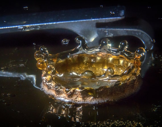Kind of Beer (Prints) Beer dripping into a beer bottle cap photograph