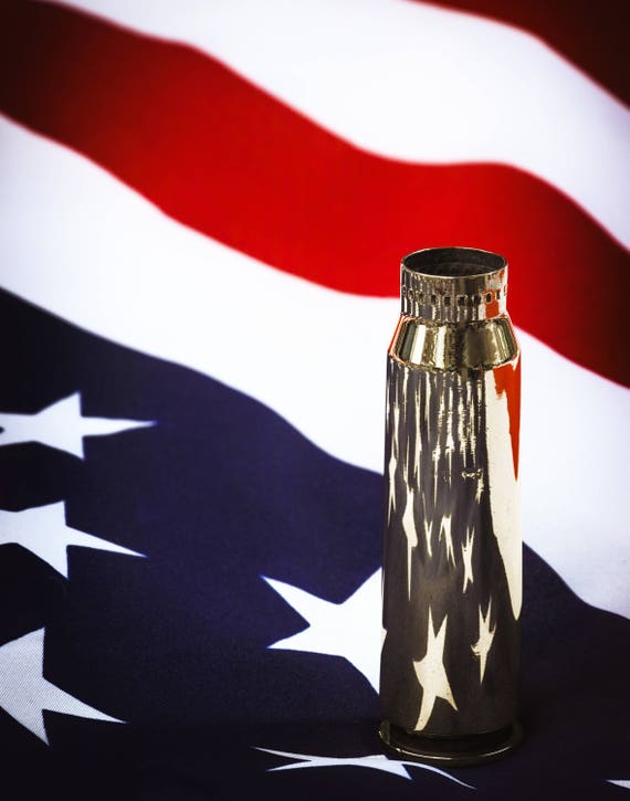 Red White and Brass (prints) the American Flag and a 20mm Brass Casing