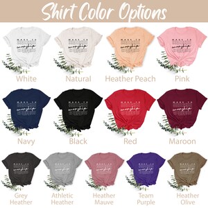 May include: A selection of t-shirts in various colors, each featuring the text "Made to Worship" in a stylized font. The colors include white, natural, heather peach, pink, navy, black, red, maroon, grey heather, athletic heather, heather mauve, team purple, and heather olive.