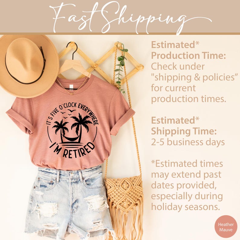 May include: A heather mauve t-shirt with rolled sleeves, paired with denim shorts and a straw hat. The shirt features a black graphic with palm trees, a hammock, and the text "IT'S FIVE O'CLOCK EVERYWHERE I'M RETIRED."