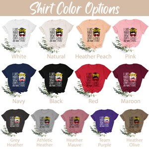 May include: A graphic t-shirt design featuring a woman with sunglasses and a bun, with the text "I like murder shows comfy clothes and maybe 3 people". The shirt is available in 12 different colors: white, natural, heather peach, pink, navy, black, red, maroon, grey heather, athletic heather, heather mauve, team purple, and heather olive.