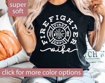 May include: Black t-shirt with a white firefighter emblem and the text "Firefighter Wife".