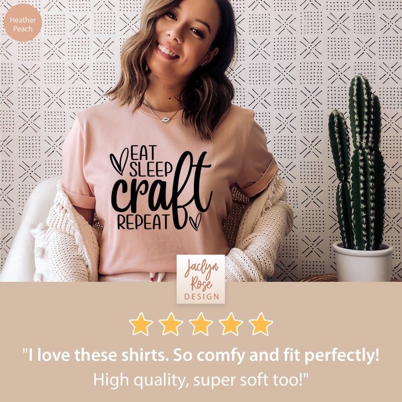 May include: A pink t-shirt with the text "Eat Sleep Craft Repeat" in black lettering. The shirt is being worn by a person and has a five-star rating.