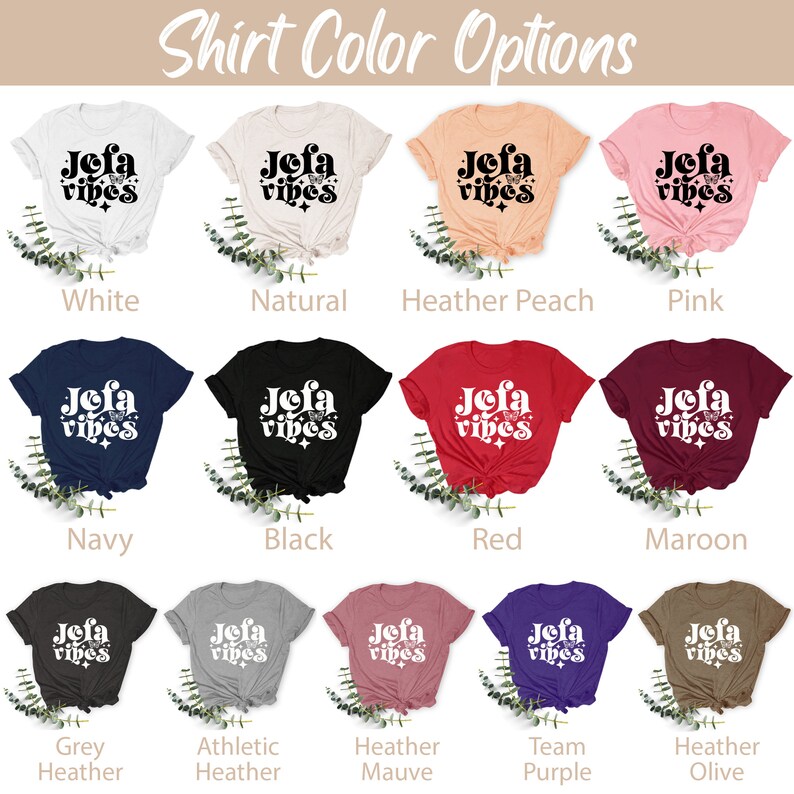 May include: A variety of t-shirts in different colors, each featuring the text "Jofa Vibes" in a retro font with a butterfly graphic. Colors include white, natural, peach, pink, navy, black, red, maroon, grey, athletic heather, mauve, purple, and olive.