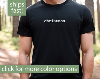 May include: Black t-shirt with the word "christmas." printed in white on the front.