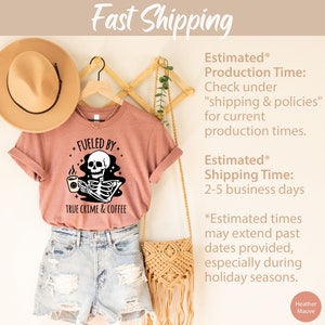 May include: A heather mauve t-shirt with a skeleton holding a coffee cup and the text "Fueled by True Crime & Coffee".