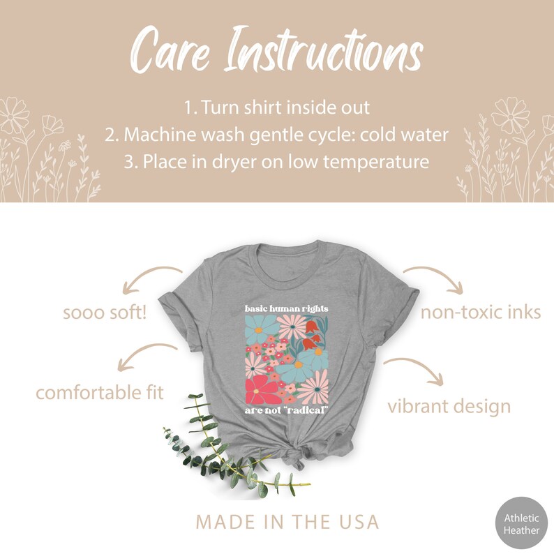 May include: Gray t-shirt with a floral design and the text "basic human rights are not 'radical'" printed on the front. The shirt is made in the USA.