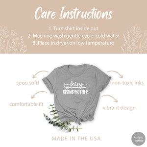 K&ouml;nnte beinhalten: Ein graues T-Shirt mit dem Text "fairy grandmother" in wei&szlig;en Buchstaben. Das Shirt ist in den USA hergestellt und bietet eine bequeme Passform, ungiftige Tinten und ein lebendiges Design.