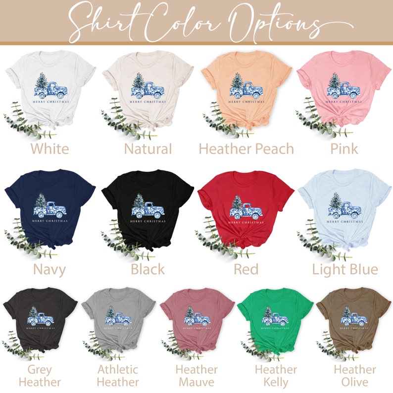 May include: A selection of t-shirt colors with a Christmas truck design. The colors include white, natural, heather peach, pink, navy, black, red, light blue, grey heather, athletic heather, heather mauve, heather kelly, and heather olive.