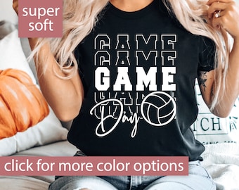 May include: Black t-shirt with white text that reads "Game Day" with a volleyball graphic. The text is stacked and reads "Game Day" three times.