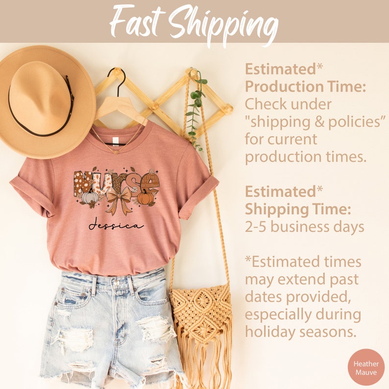 May include: A heather mauve t-shirt with a fall-themed "Nurse" graphic and the name "Jessica" printed on the front. The shirt is displayed on a hanger with a straw hat and a woven bag.