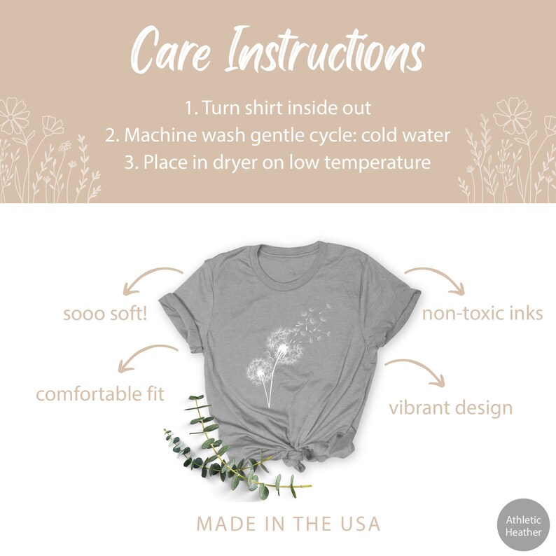 May include: A heather grey t-shirt with a white dandelion design. The shirt is made in the USA and features a comfortable fit, soft fabric, and non-toxic inks. Care instructions are included: turn shirt inside out, machine wash gentle cycle cold water, and place in dryer on low temperature.