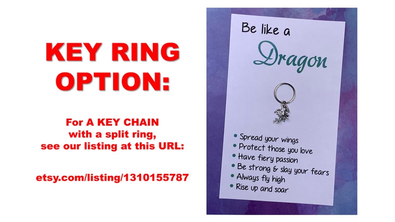 May include: A silver dragon keychain with a split ring. The keychain is attached to a card with the text "Be like a Dragon" and a list of dragon-themed affirmations: "Spread your wings", "Protect those you love", "Have fiery passion", "Be strong & slay your fears", "Always fly high", "Rise up and soar".