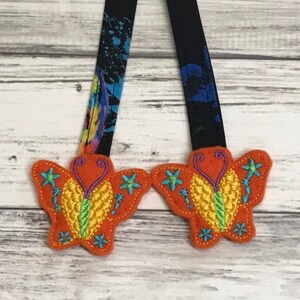 BUTTERFLY Reach Straps or Butterflies Charms. Tula Explore. Lillebaby Serenity. Emeibaby. Pikkolo. Boba. Happy Baby. Free to Grow Charms.