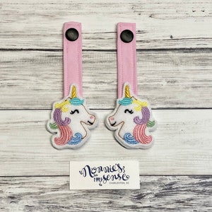 UNICORN hengsels en draaghangers. Tula. Boba. Pikkolo. Rijsel. Emeibaby. Gelukkige baby. Kinderpakket. Verkennen. Vrij om te groeien. Tula geweven