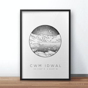 May include: Black and white illustration of a mountain lake with a crescent moon in the sky. The text "CWM IDWAL 53.1158° N 4.0259° W" is below the image.