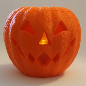 3D Printed pumpkin with flickering LED candle effect light image 1