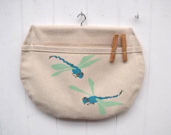 PearPrint peg bag in natural organic cotton with dragonflies. Pond theme clothes pin bag.