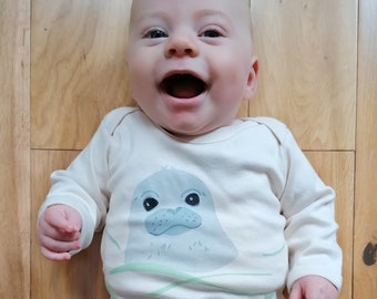 Swimming seal pup organic cotton baby sleepsuit. Baby grow. Pyjamas. Baby boy or baby girl gift.