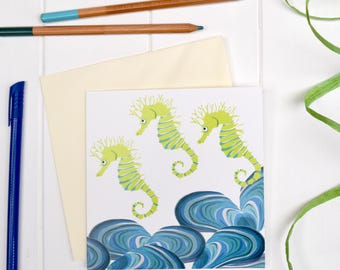 Tarjeta de felicitación de caballitos de mar.