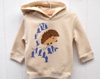 Baby hoodie with hedgehog and bluebells, natural organic cotton. Baby boy or baby girl gift.