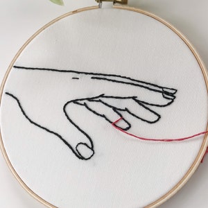 embroidery hoop art. embroidered. hand embroidery. modern embroidery. long distance relationship. long distance. red string of fate. image 6