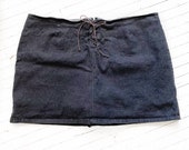 Plus size stretch black lace up denim skorts. Size 28.