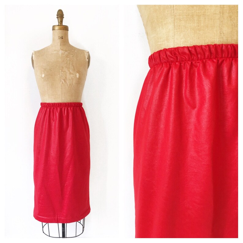 Red leather look high waisted pencil skirt with elastic waistband Size M.