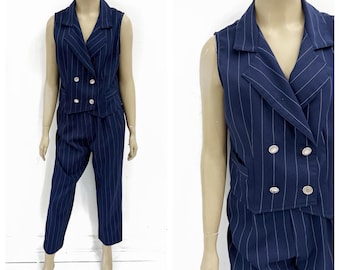 Navy pinstripe vest and slacks suit. Made in USA. Size M.