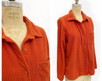 Orange soft velour corduroy button up. Size L.