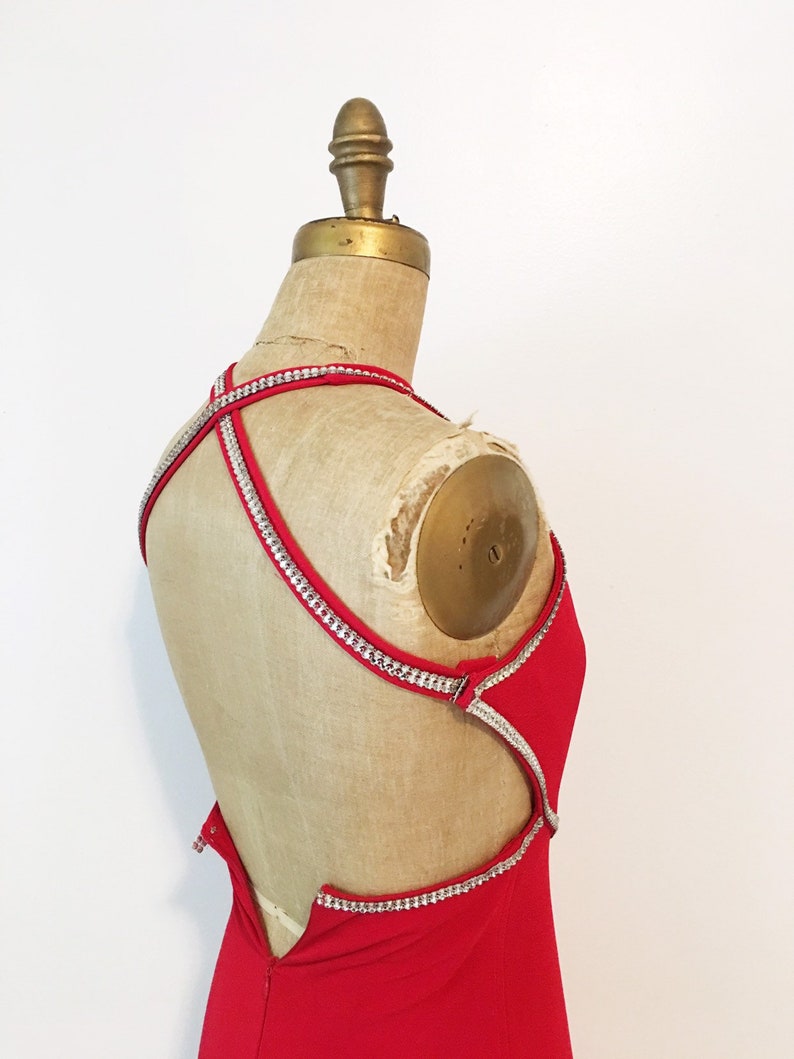 Red hot rhinestone trimmed stretch gown with low back Size S.