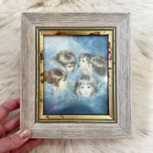 Sweet antique dreamy cherub print. Eaton's. Framed print.
