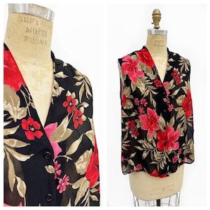 Plus size semi sheer rayon floral sleeveless blouse. Size 1XL.