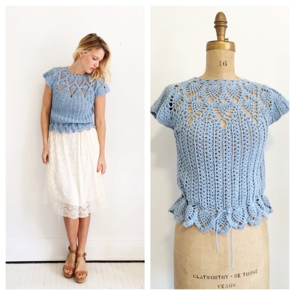 1930's style powder blue peplum crochet blouse with waist tie. Size S/M.