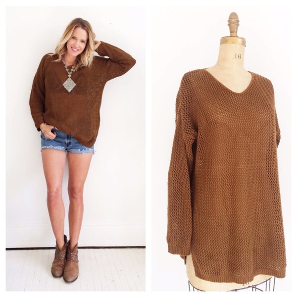 Open knit perfectly slouchy brown V-neck sweater. Size M/L.