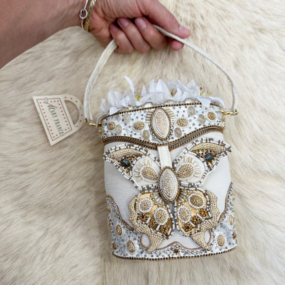 Ornate ivory butterfly Mary Francis top handle floral basket bag 