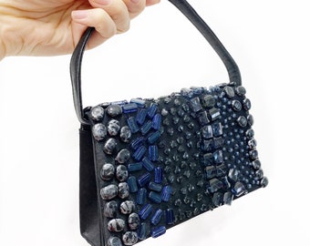 Fun BIJOUX TERNER bead embellished black hand bag.