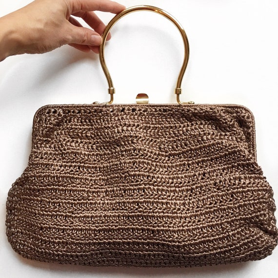 1960's mocha crochet hand bag with gold top handle