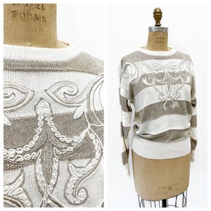 Slouchy cream metallic striped knit cotton rayon sweater. Size M.